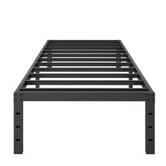 a black metal bed frame with four legs