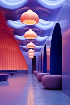 an artisticly designed hallway with blue and pink lighting