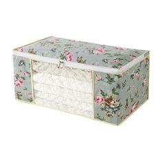 an image of a flowered box with white lace on the bottom and pink flowers all over it