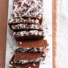 chocolate cake with white frosting and candy canes