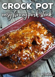 crock pot easy honey pork steak in a red casserole dish with text overlay