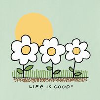 three daisies growing in the ground with words life is good written below one flower