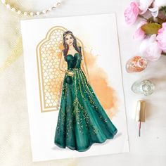 a card with a watercolor drawing of a woman in a green dress on it