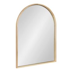 an arched wooden mirror on a white background