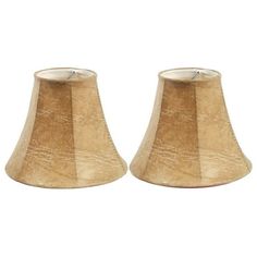 two small lampshades sitting next to each other