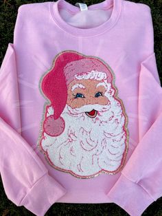 Abln Boutique Patches - very detailed design, high quality chenille, thick patch & adhesive for long lasting wear made with our vibrant signature pink color - This listing is for a completed sweatshirt made as is shown exactly in photo! Please indicate any color request changes may need in request box  DETAILS : ✨S Patch Sweatshirt Ideas, Chenille Patch Sweatshirt, Boutique Tees, Christmas Boutique, Patch Sweatshirt, Sweatshirt Ideas, Christmas Fits, Chenille Patch, Pink Santa