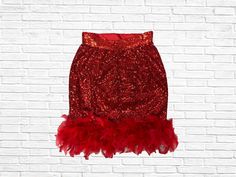 Very vibrant red sequin skirt trimmed with red feathers  **SIZE INCLUSIVE  Available in sizes XS - 4XL PLEASE view size chart provided before placing your order   From waist to hem the skirt measures 20 inches long ( able to be lengthened by request for an additional fee)  There are no returns given for my custom made items, even exchange or merchandise credit only! Red Sequin Skirt, Date Night Outfits, Holiday Skirts, Feather Skirt, Red Feather, Sequin Mini Skirts, Red Sequin, Sequin Mini, Valentine's Day Outfit