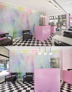 the interior of a hair salon with pink and blue walls, checkered flooring and chairs