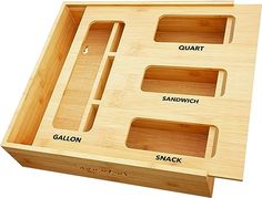 a wooden tray with compartments for different items