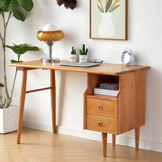 Introducing our artisan-crafted cherry wood desk, a masterpiece of elegance and functionality. Boasting a seamless drawer front, it's wooden grain flows gracefully, reflecting the desk's exquisite quality. Sturdy tapered legs offer unwavering stability, while ample legroom ensures maximum comfort. Smooth-gliding drawers, guided by solid wood rails, promise a lifetime of seamless use. The sleek desktop is perfect for laptops, notes, and more, while rounded edges add a touch of safety. With it's v Cherry Wood Desk, Solid Wood Desk, Vintage Style Rings, Desk Space, Work Desk, Wood Desk, Drawer Fronts, Writing Desk, Orren Ellis