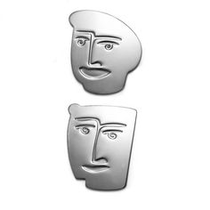 two metal faces are shown on a white background and one has a face in the shape of a man's head