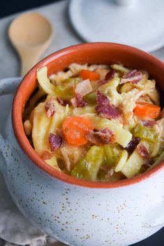 a close up of a bowl of food on a table