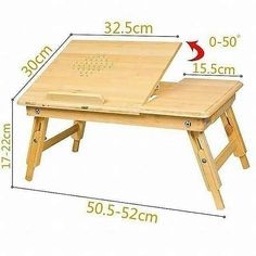 a wooden desk with a drawing board on it and measurements for the table top area