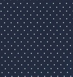 a black and white polka dot fabric with small white dots on the dark blue background