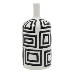 a black and white vase sitting on top of a table