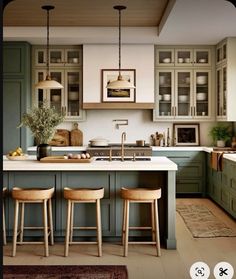 an image of a kitchen setting with stools in the middle and island countertop