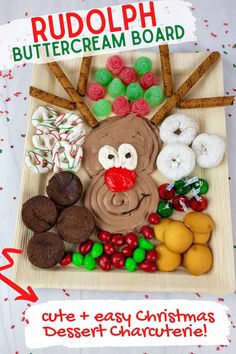 a platter filled with cookies, candy and pretzels