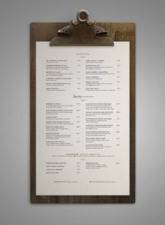 a clipboard with a menu attached to it