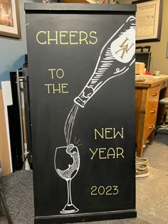 a sign advertising cheers to the new year