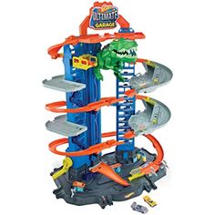 a toy set with a dinosaur and cars on the top of it's tower