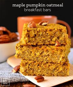 three pieces of pumpkin oatmeal breakfast bars stacked on top of each other