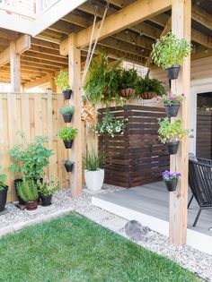 an outdoor patio with potted plants on it