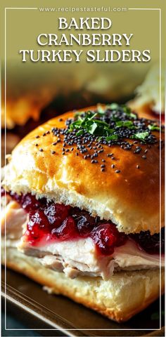 a turkey slider with cranberry sauce is shown on a baking sheet and the words baked cranberry turkey sliders are above it