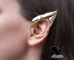 "Earrings - cuffs \"Elf\" in the shape of a sharp elf ear. They fit perfectly on the ear and are very lightweight. Possible materials of manufacture: \"Silver\" -  Nickel Silver (Jewelry alloy of silver color, does not contain silver. Other name: Maillechort, German silver.) \"Gold\" - Brass (Jewelry alloy of gold color) \"Sterling Silver\" - 925 Sterling Silver (This is a precious 925 alloy) All the jewelry in my shop is made by hand. With love and individually. This means that minor differences from the original are possible, but it also means that you receive a unique work of art. Term of manufacturing of the order of 2-4 weeks. I understand that this is a long time. But manual work requires a lot of time. Have patience and you will receive a unique handmade jewelry from the Studio Mani Fantasy Style Pierced Cartilage Earrings For Gift, Fantasy Metal Ear Cuff For Pierced Ears, Fantasy Metal Ear Cuff For Gift, Unique Adjustable Jewelry For Cosplay, Fantasy Style Single Ear Cuff As Gift, Handmade Fantasy Metal Cartilage Earrings, Elven Style Metal Jewelry Gift, Elven Style Metal Jewelry For Gifts, Handmade Metal Fantasy Cartilage Earrings