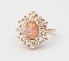 an opal and diamond cluster ring