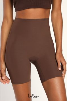 Don't shy away from that figure-skimming dress, slip into the Commando Classic Control Mocha Shapewear Shorts! These raw-cut microfiber blend shorts have light-to-moderate compression to smooth your silhouette throughout the waist and thighs and blend seamlessly under snug garments. Fit: This garment fits true to size. Length: Mid-thigh. Size medium measures 17" from waist to hem. Inseam: 6.00 Front Rise: 10.00 Waist: Fitted - elastic waist allows stretch. Hip: Fitted - stretchy fabric allows ro Shapewear Shorts, Dress Slip, Body Shapers, Bottom Clothes, Stretchy Fabric, Shapewear, Mocha, Elastic Waist, Size Medium