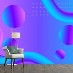 a chair sitting in front of a wall with purple and blue circles on it's side