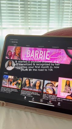 a tablet with the website barbie on it