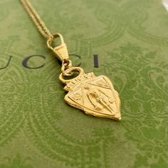 Vintage Gucci Gg Charm Pendant Necklace Authentic Vintage Gucci Charm Pendant 18” 18k Gold Plated Sterling Silver Necklace (Unbranded) Black Velvet Necklace Display Box (Unbranded) Color: Gold Pendant Size: Approximately 1” X 1.5” Chain Length: 18” Chain Width: 1.1mm Ships Same Or Next Day *This Is An “Upcycled” Item That May Have Minor Imperfections Including Light Fading And Wear. See Photos For Quality. Classic Yellow Gold Necklace With Logo Charm, Gold Medallion Necklace With Logo Charm, Yellow Gold Medallion Necklace With Logo Charm, Classic Necklace With Logo Charm For Gift, Classic Necklace With Logo Charm As Gift, Classic Logo Charm Necklace For Gifts, Gold Necklace With Logo Charm For Gift, Gold Necklace With Logo Charm As Gift, Yellow Gold Necklace With Logo Charm For Gifts