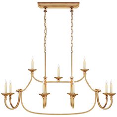 a large chandelier with six candles hanging from the bottom and four lights on each end