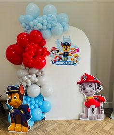 balloons are arranged in the shape of paw patrol and fireman sam's dog