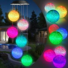 multicolored lights hanging from the ceiling in front of a house at night time