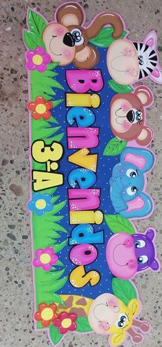 there is a sign that says happy birthday with animals on the front and side of it