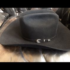 This Beautiful Black Rodeo King 7x Hat Has Only Been Worn A Handful Of Times And Has No Signs Of Wear On The Sweatband Or The Lining. The Felt Itself Has Two Small Imperfections On Left Side Of The Crown And Brim As Shown In The Last Picture, Though These Are Very Hard To Spot. This Hat Is Great For Both Casual And Formal Occasions And Would Be A Great Gift For The Western Lover In Your Life! Black Felt Cowboy Hat, Black Rodeo, Felt Cowboy Hat, King Black, Felt Cowboy Hats, Last Days, Black Felt, Cowboy Hat, The Crown