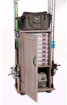 a wooden cabinet with fishing rods and tacklers on it's sides, in front of a white background