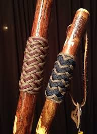 two wooden sticks with rope wrapped around them