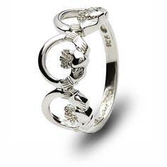 a white gold ring with diamonds on the bottom and two hearts in the middle,