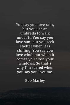 an image with the words you say you love rain, but you use an umbrella to walk under it