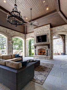 a living room with couches and a fireplace