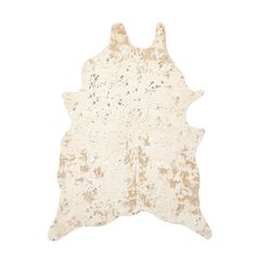 a white and brown cowhide rug on a white background