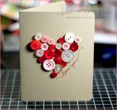 a card with buttons in the shape of a heart