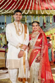 a man and woman standing next to each other