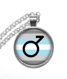 a necklace with an image of the symbol for male and female in blue, white and grey stripes