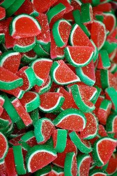 red and green candies are stacked together in the shape of heart shaped candy hearts