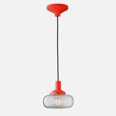 a red light hanging from a ceiling fixture