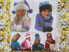 four children's hats and mittens are shown on the cover of a sewing pattern